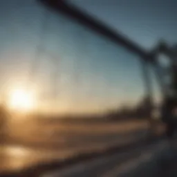 Close-up view of a cracked windshield reflecting sunlight