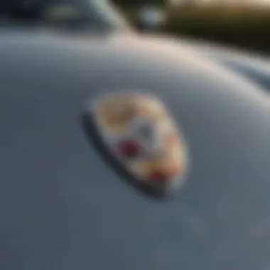 Detail of the Iconic Porsche Emblem Close-up of a Porsche emblem on a car hood