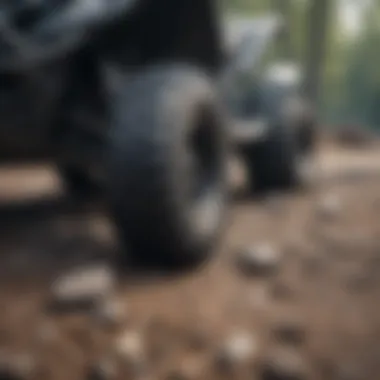 Durability on Challenging Surfaces Close-up of an ATV's durable tires on rocky terrain