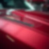 Close-up of a flawless vehicle finish highlighting the intricate detailing work