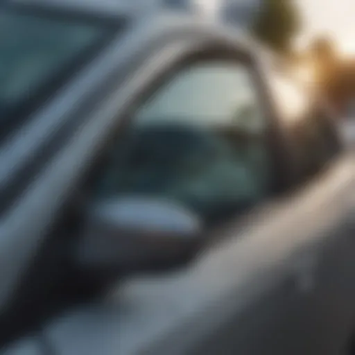 Close-up of a car's front passenger window with visible damage