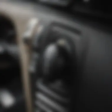 A close-up of a car ignition and a fob keyhole