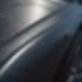 Close-up view of a deep scratch on a car's surface
