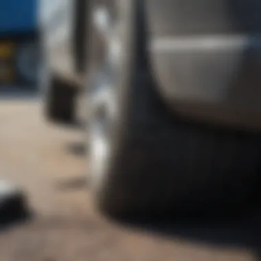 Close-up view of a deflated tire on a vehicle