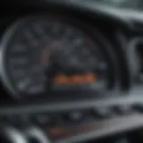 Close-up of a used car's dashboard showing financial data