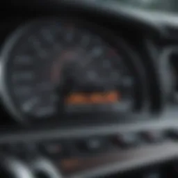 Close-up of a used car's dashboard showing financial data