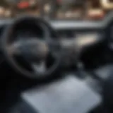 Close-up of a car dashboard with financial documents
