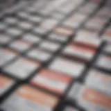 A detailed view of various vehicle registration forms stacked on a desk.