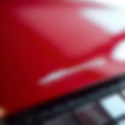 Close-up of a car scratch on a glossy surface